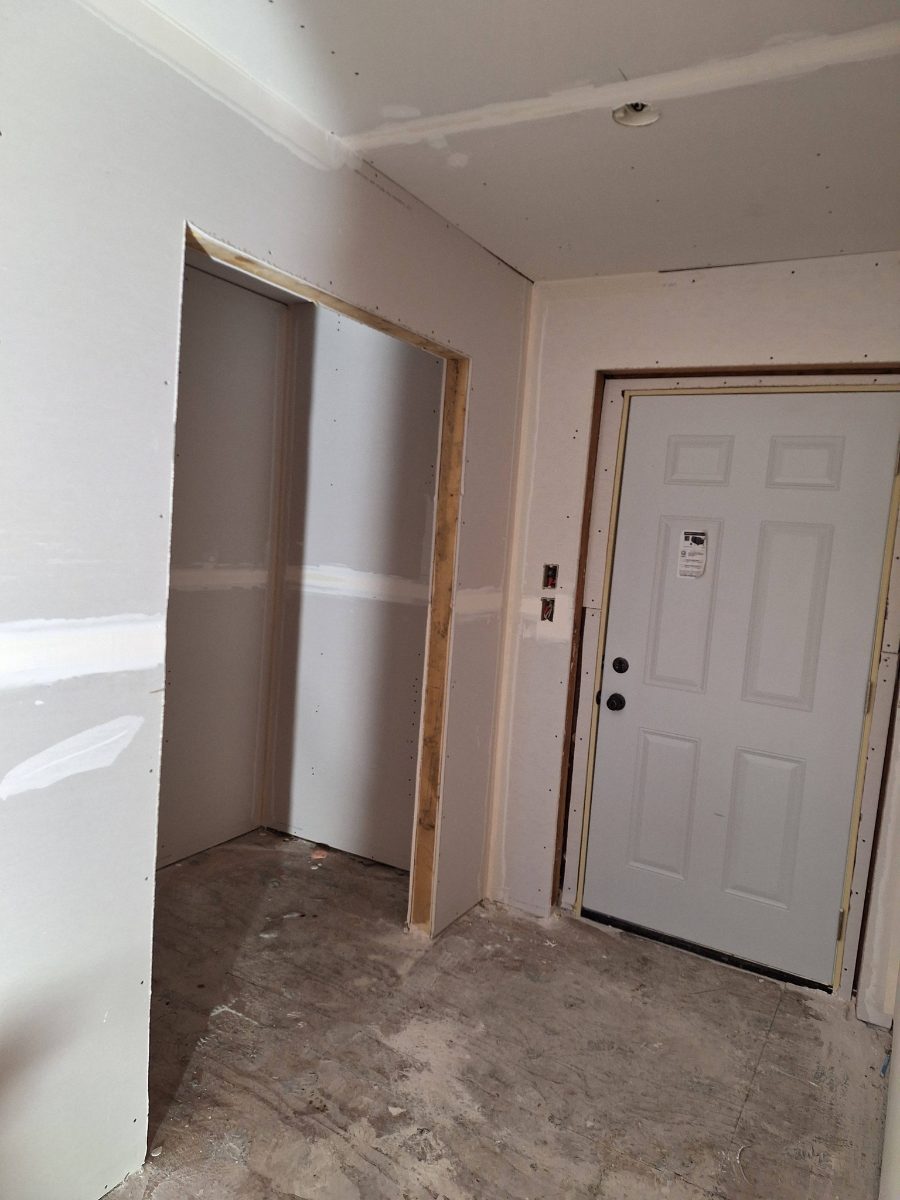 Drywall finishing around a closet and interior wall corner