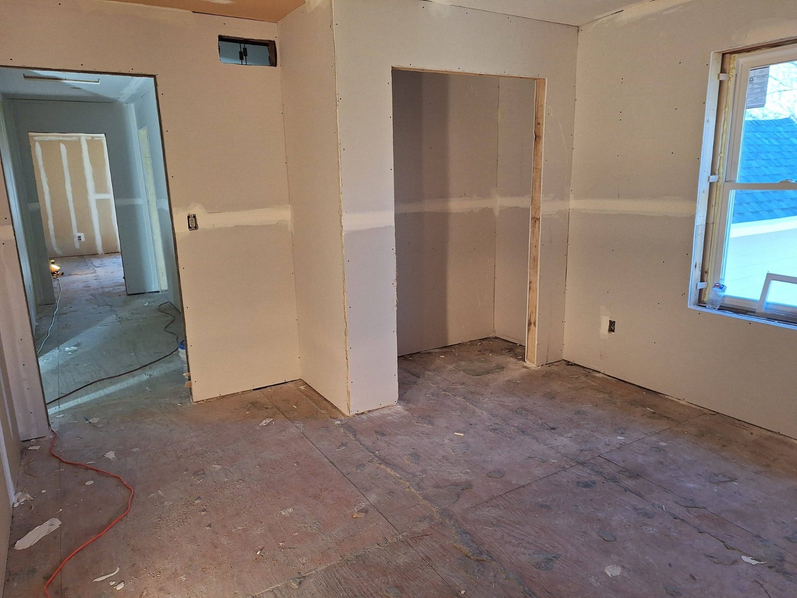 Large interior room with drywall finishing in progress